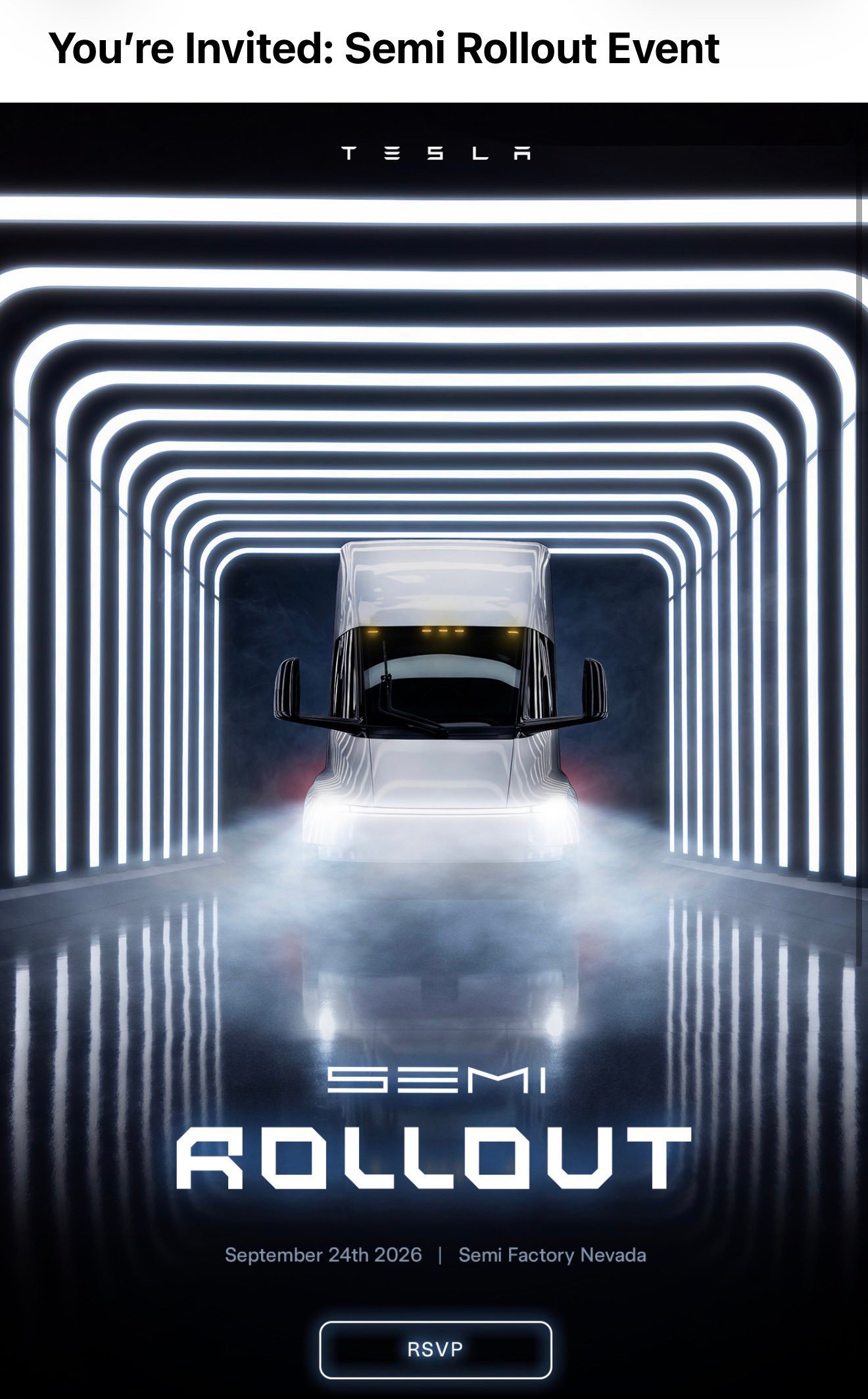 Napis TESLA na dachu fabryki Semi w Sparks o zmierzchu